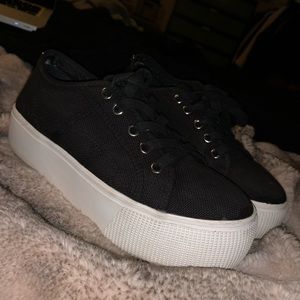 Black platform sneakers
